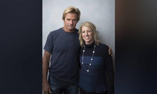 Laird Hamilton, left, and director Rory Kennedy pose for a portrait to promote the film, "Take Every Wave: The Life of Laird Hamilton", at the Music Lodge during the Sundance Film Festival on Sunday, Jan. 22, 2017, in Park City, Utah. (Photo by Taylor Jewell/Invision/AP)